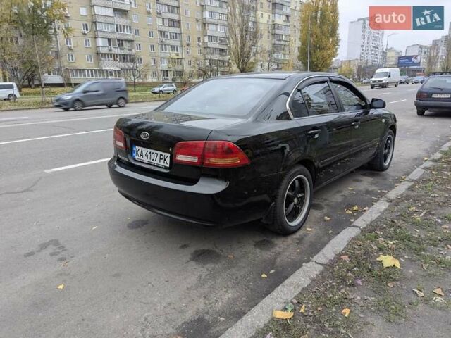 Черный Киа Маджентис, объемом двигателя 2 л и пробегом 236 тыс. км за 6000 $, фото 4 на Automoto.ua