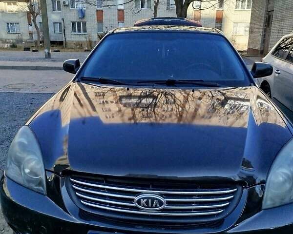 Черный Киа Маджентис, объемом двигателя 2 л и пробегом 244 тыс. км за 3700 $, фото 4 на Automoto.ua