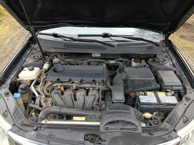 Чорний Кіа Маджентіс, об'ємом двигуна 2 л та пробігом 212 тис. км за 4950 $, фото 14 на Automoto.ua