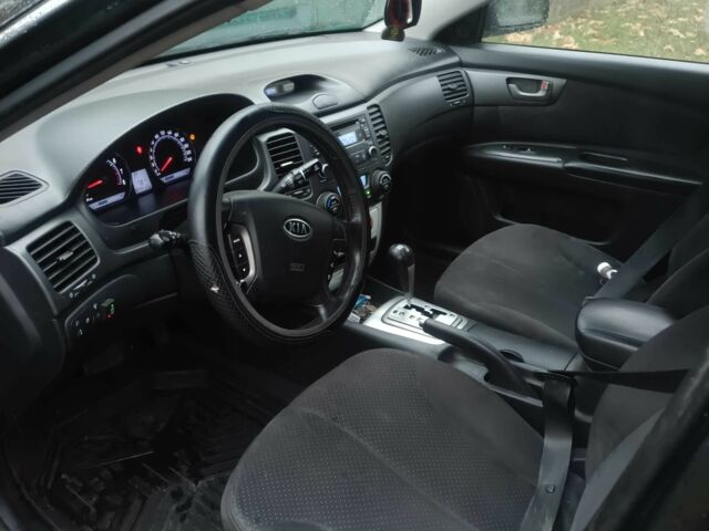 Черный Киа Маджентис, объемом двигателя 2 л и пробегом 100 тыс. км за 4800 $, фото 6 на Automoto.ua