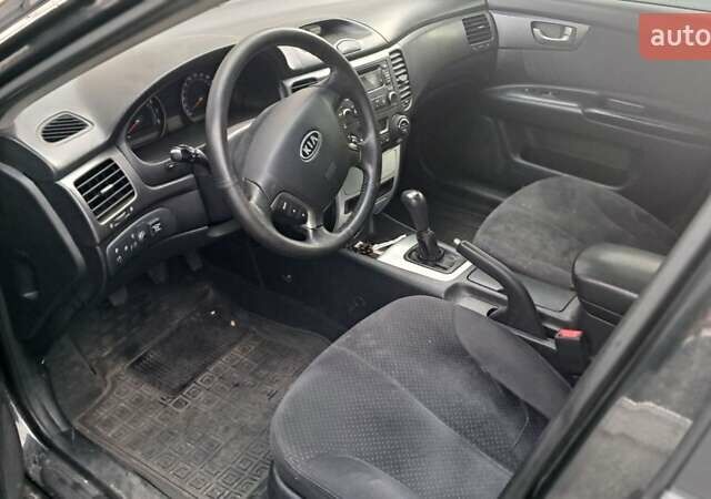 Чорний Кіа Маджентіс, об'ємом двигуна 2 л та пробігом 169 тис. км за 4199 $, фото 3 на Automoto.ua