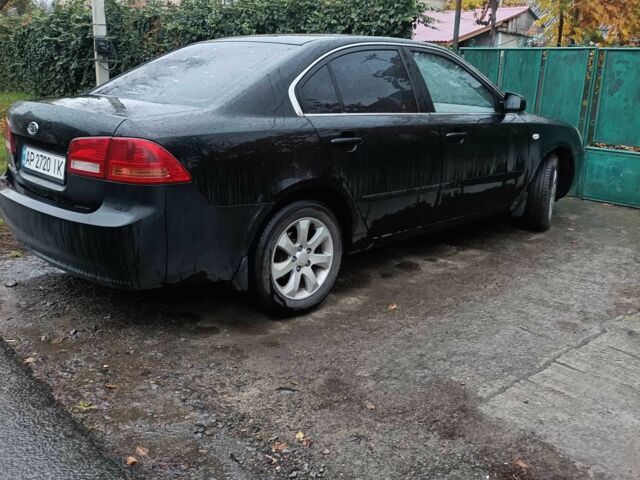 Черный Киа Маджентис, объемом двигателя 2 л и пробегом 100 тыс. км за 4800 $, фото 9 на Automoto.ua