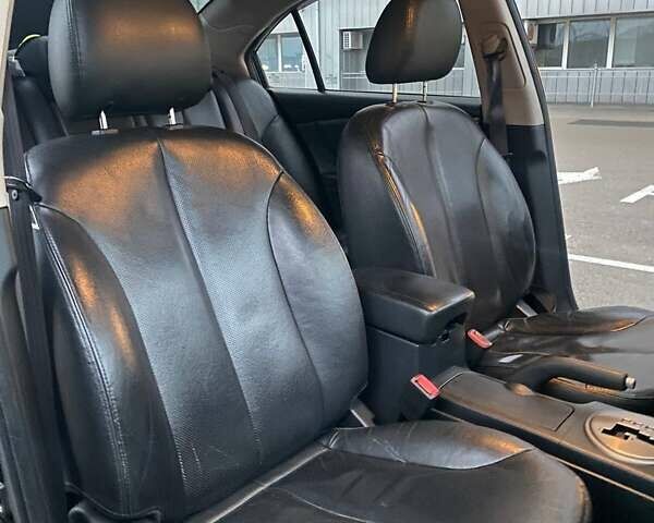 Черный Киа Маджентис, объемом двигателя 2 л и пробегом 208 тыс. км за 6400 $, фото 11 на Automoto.ua