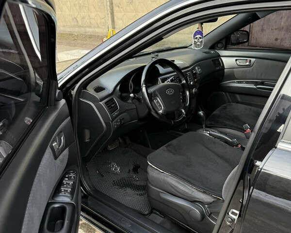 Черный Киа Маджентис, объемом двигателя 2 л и пробегом 148 тыс. км за 6500 $, фото 6 на Automoto.ua