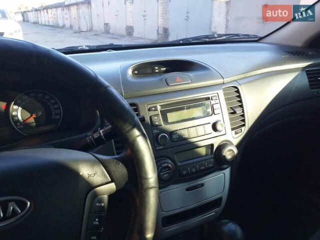 Черный Киа Маджентис, объемом двигателя 2 л и пробегом 190 тыс. км за 6500 $, фото 18 на Automoto.ua