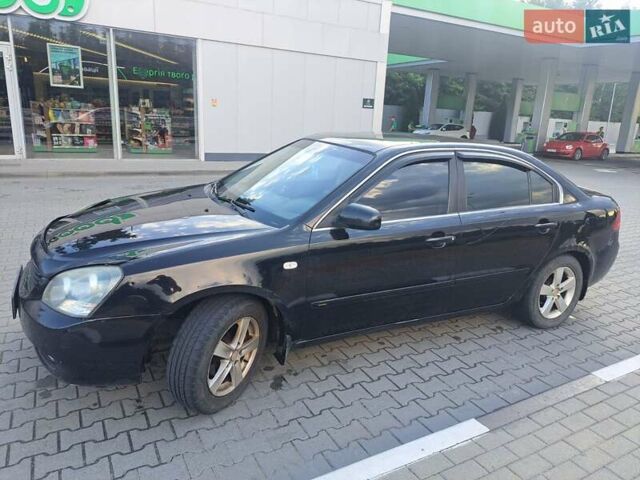 Черный Киа Маджентис, объемом двигателя 2 л и пробегом 237 тыс. км за 5400 $, фото 10 на Automoto.ua