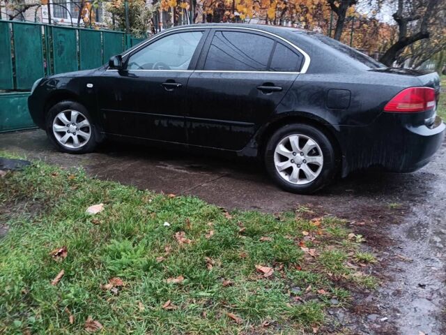 Черный Киа Маджентис, объемом двигателя 2 л и пробегом 100 тыс. км за 4800 $, фото 8 на Automoto.ua