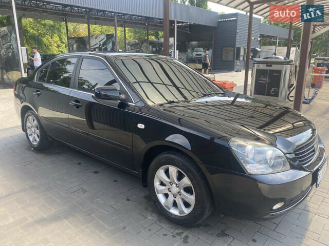 Черный Киа Маджентис, объемом двигателя 2 л и пробегом 275 тыс. км за 6699 $, фото 3 на Automoto.ua