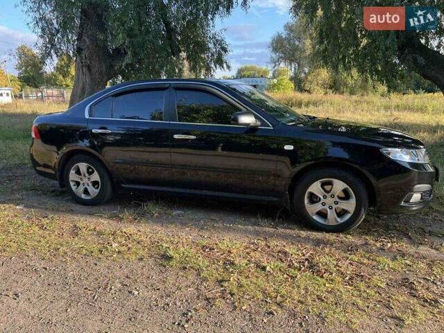 Чорний Кіа Маджентіс, об'ємом двигуна 2 л та пробігом 227 тис. км за 5650 $, фото 6 на Automoto.ua