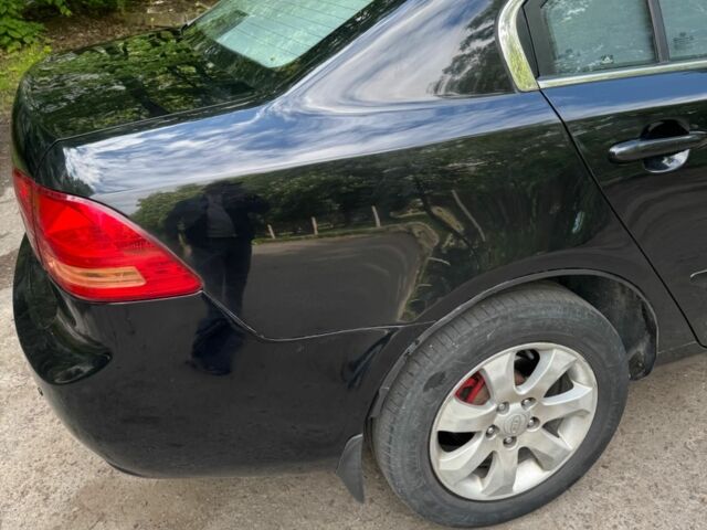 Черный Киа Маджентис, объемом двигателя 2 л и пробегом 300 тыс. км за 4501 $, фото 3 на Automoto.ua