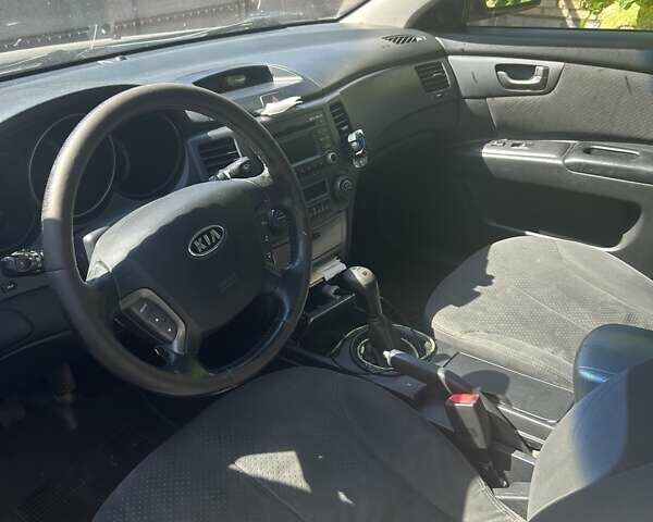 Чорний Кіа Маджентіс, об'ємом двигуна 2 л та пробігом 230 тис. км за 5300 $, фото 3 на Automoto.ua