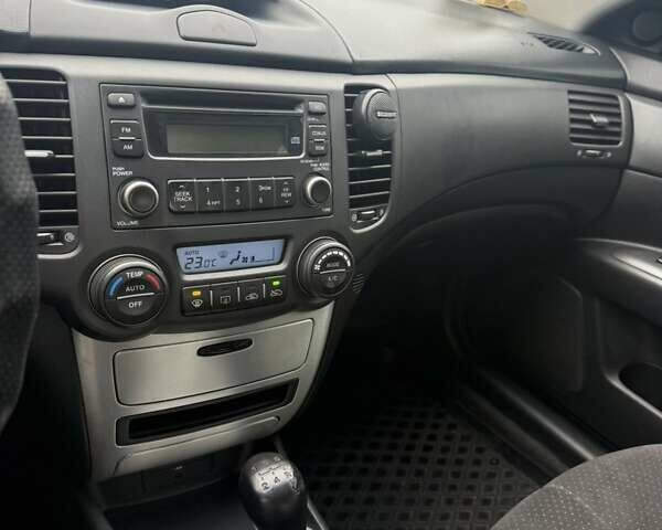 Черный Киа Маджентис, объемом двигателя 2 л и пробегом 115 тыс. км за 7200 $, фото 17 на Automoto.ua