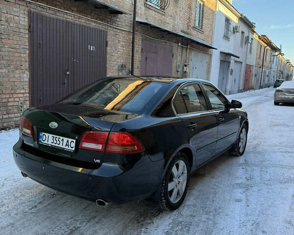 Черный Киа Маджентис, объемом двигателя 2.66 л и пробегом 250 тыс. км за 4850 $, фото 12 на Automoto.ua