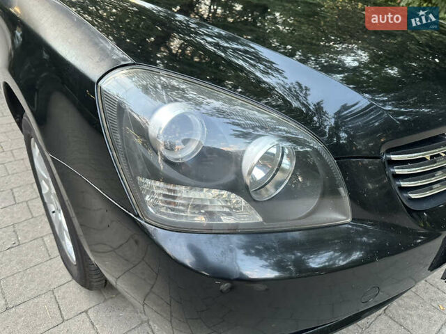 Черный Киа Маджентис, объемом двигателя 2 л и пробегом 362 тыс. км за 4300 $, фото 15 на Automoto.ua