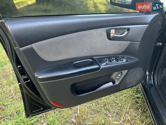Черный Киа Маджентис, объемом двигателя 2 л и пробегом 227 тыс. км за 5800 $, фото 19 на Automoto.ua