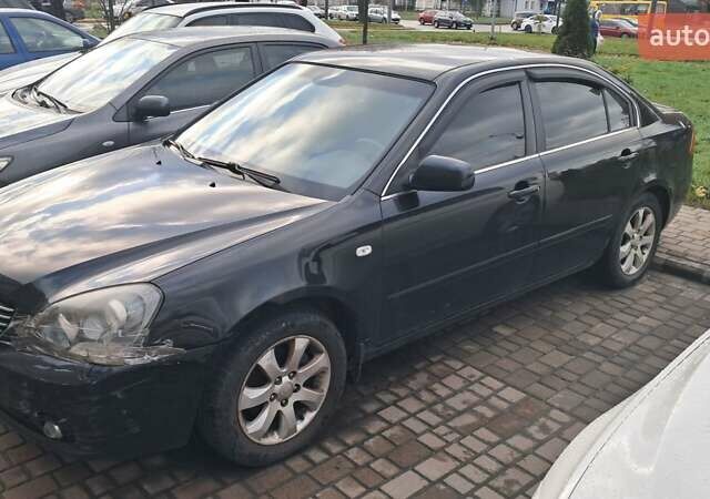 Чорний Кіа Маджентіс, об'ємом двигуна 2 л та пробігом 169 тис. км за 4199 $, фото 2 на Automoto.ua