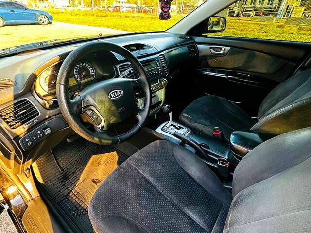 Черный Киа Маджентис, объемом двигателя 2 л и пробегом 225 тыс. км за 5999 $, фото 6 на Automoto.ua