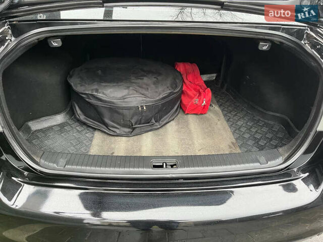 Чорний Кіа Маджентіс, об'ємом двигуна 2 л та пробігом 250 тис. км за 6999 $, фото 13 на Automoto.ua