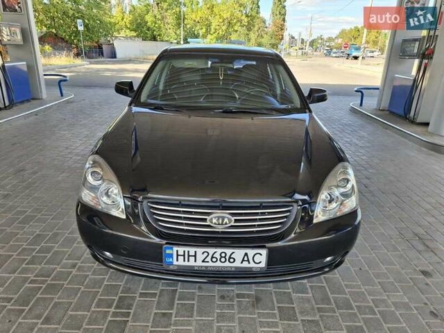 Чорний Кіа Маджентіс, об'ємом двигуна 2 л та пробігом 192 тис. км за 6600 $, фото 2 на Automoto.ua