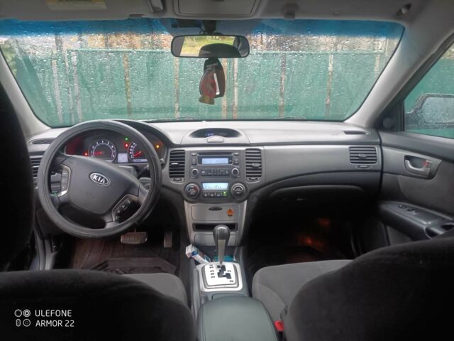 Черный Киа Маджентис, объемом двигателя 2 л и пробегом 100 тыс. км за 4800 $, фото 4 на Automoto.ua