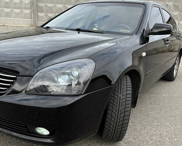 Чорний Кіа Маджентіс, об'ємом двигуна 2 л та пробігом 244 тис. км за 5200 $, фото 11 на Automoto.ua