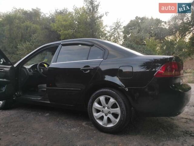 Черный Киа Маджентис, объемом двигателя 2 л и пробегом 228 тыс. км за 5500 $, фото 2 на Automoto.ua