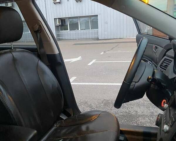 Черный Киа Маджентис, объемом двигателя 2 л и пробегом 208 тыс. км за 6400 $, фото 24 на Automoto.ua