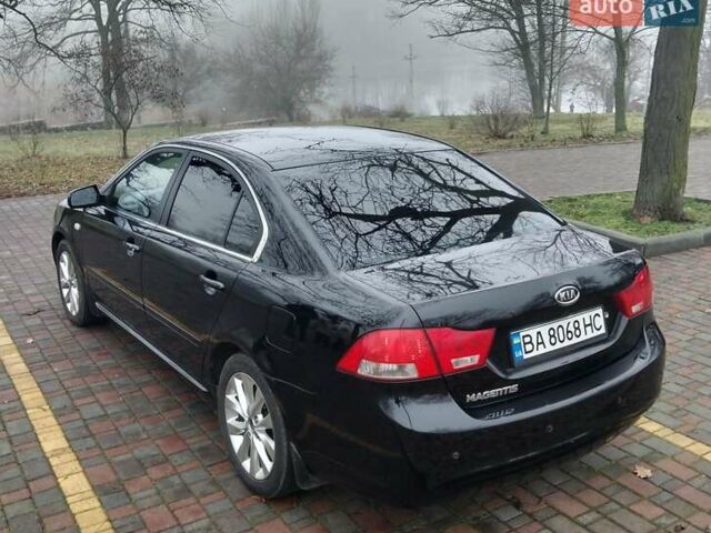 Чорний Кіа Маджентіс, об'ємом двигуна 2 л та пробігом 215 тис. км за 6700 $, фото 10 на Automoto.ua
