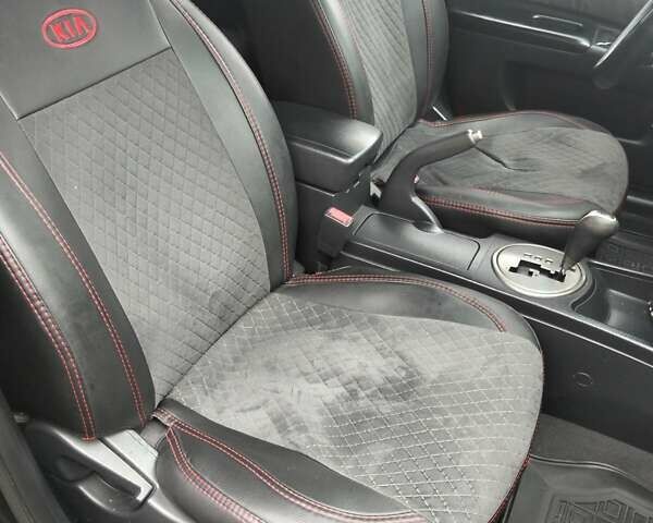 Чорний Кіа Маджентіс, об'ємом двигуна 2 л та пробігом 215 тис. км за 6700 $, фото 1 на Automoto.ua