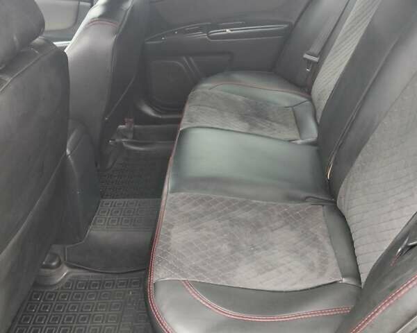 Чорний Кіа Маджентіс, об'ємом двигуна 2 л та пробігом 215 тис. км за 6700 $, фото 5 на Automoto.ua