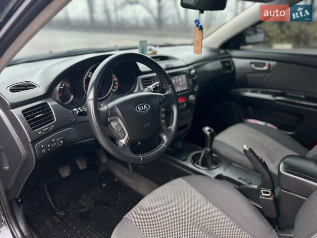 Черный Киа Маджентис, объемом двигателя 2 л и пробегом 229 тыс. км за 5555 $, фото 27 на Automoto.ua