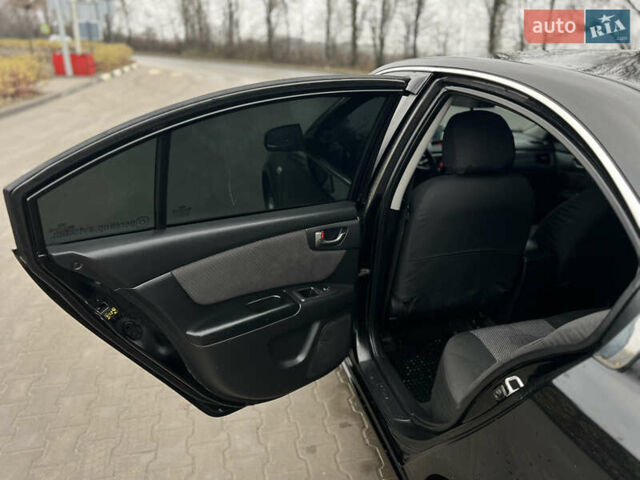 Черный Киа Маджентис, объемом двигателя 2 л и пробегом 229 тыс. км за 5555 $, фото 65 на Automoto.ua