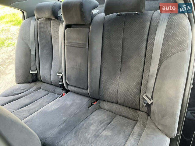 Чорний Кіа Маджентіс, об'ємом двигуна 2 л та пробігом 151 тис. км за 6699 $, фото 49 на Automoto.ua
