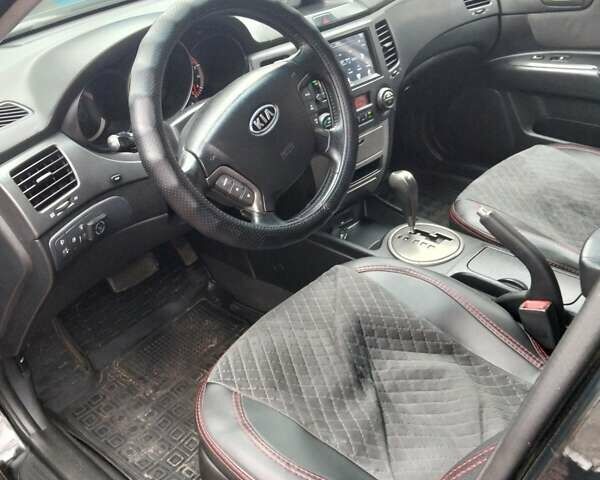 Чорний Кіа Маджентіс, об'ємом двигуна 2 л та пробігом 215 тис. км за 6700 $, фото 4 на Automoto.ua