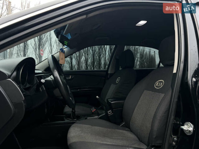 Черный Киа Маджентис, объемом двигателя 2 л и пробегом 229 тыс. км за 5555 $, фото 36 на Automoto.ua