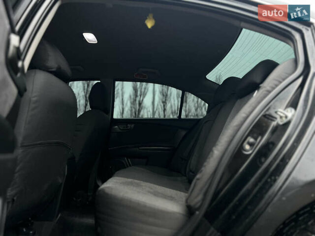Черный Киа Маджентис, объемом двигателя 2 л и пробегом 229 тыс. км за 5555 $, фото 39 на Automoto.ua