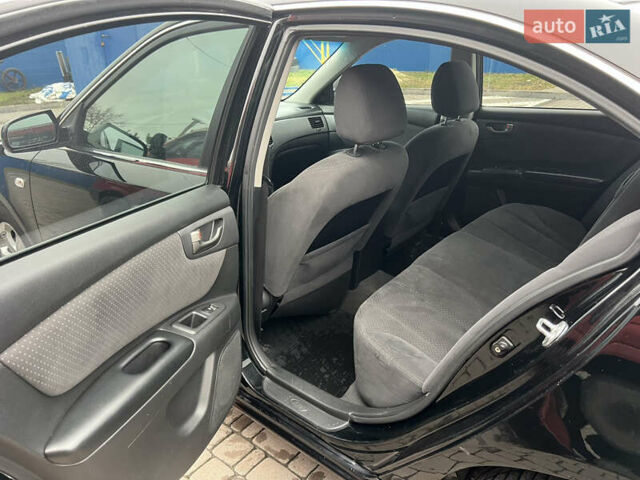 Черный Киа Маджентис, объемом двигателя 2 л и пробегом 212 тыс. км за 6500 $, фото 13 на Automoto.ua