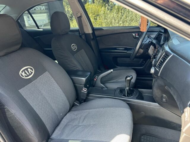 Черный Киа Маджентис, объемом двигателя 2 л и пробегом 228 тыс. км за 5999 $, фото 16 на Automoto.ua