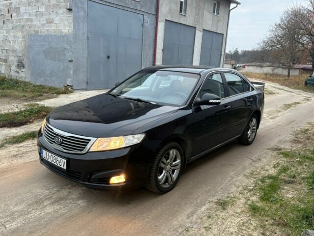 Черный Киа Маджентис, объемом двигателя 2 л и пробегом 260 тыс. км за 3100 $, фото 1 на Automoto.ua