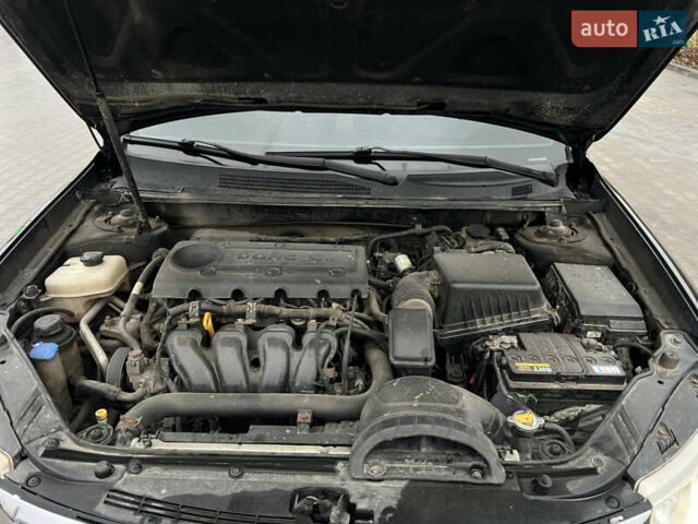 Черный Киа Маджентис, объемом двигателя 2 л и пробегом 229 тыс. км за 5199 $, фото 66 на Automoto.ua