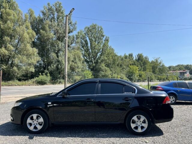 Черный Киа Маджентис, объемом двигателя 2 л и пробегом 228 тыс. км за 5999 $, фото 2 на Automoto.ua