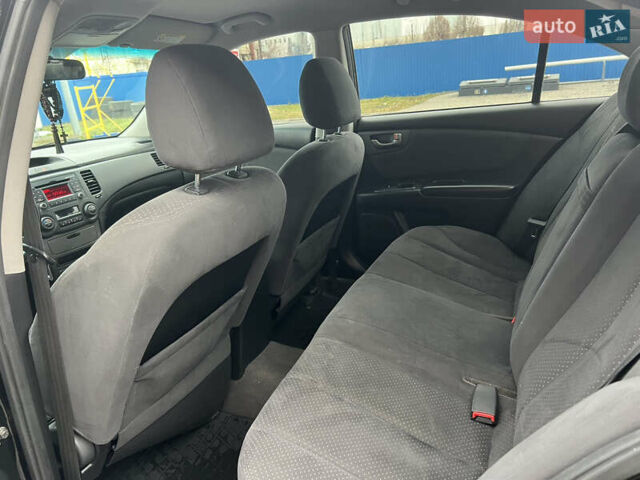 Черный Киа Маджентис, объемом двигателя 2 л и пробегом 212 тыс. км за 6500 $, фото 12 на Automoto.ua