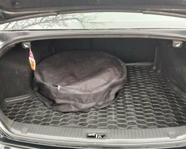 Чорний Кіа Маджентіс, об'ємом двигуна 2 л та пробігом 215 тис. км за 6700 $, фото 6 на Automoto.ua