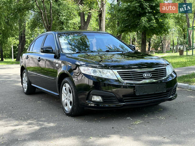 Чорний Кіа Маджентіс, об'ємом двигуна 2 л та пробігом 151 тис. км за 6699 $, фото 13 на Automoto.ua