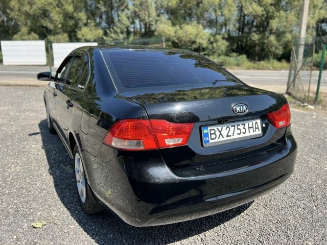 Черный Киа Маджентис, объемом двигателя 2 л и пробегом 228 тыс. км за 5999 $, фото 3 на Automoto.ua