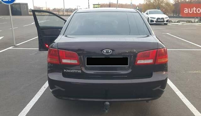 Коричневий Кіа Маджентіс, об'ємом двигуна 2 л та пробігом 278 тис. км за 5800 $, фото 7 на Automoto.ua