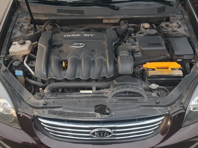 Коричневый Киа Маджентис, объемом двигателя 2 л и пробегом 278 тыс. км за 5500 $, фото 1 на Automoto.ua