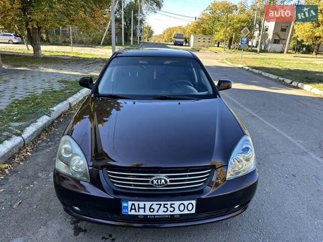 Коричневий Кіа Маджентіс, об'ємом двигуна 2 л та пробігом 191 тис. км за 4900 $, фото 2 на Automoto.ua