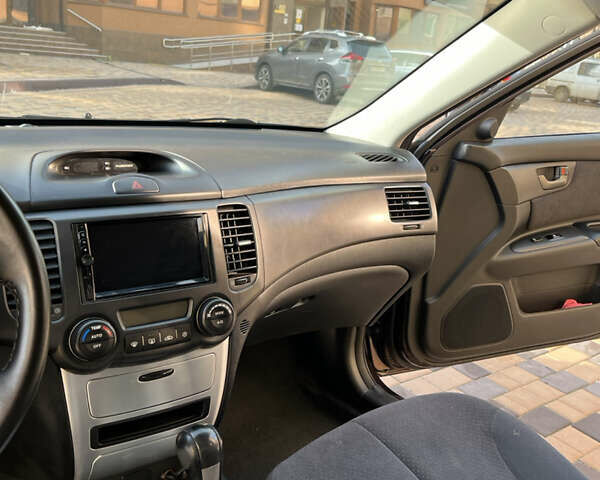 Коричневый Киа Маджентис, объемом двигателя 2 л и пробегом 192 тыс. км за 5900 $, фото 15 на Automoto.ua