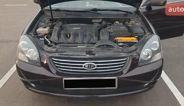 Коричневий Кіа Маджентіс, об'ємом двигуна 2 л та пробігом 278 тис. км за 5800 $, фото 13 на Automoto.ua
